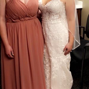 Bridesmaid dress from Morí Lee but matches “Spice” color from Kennedy Blue